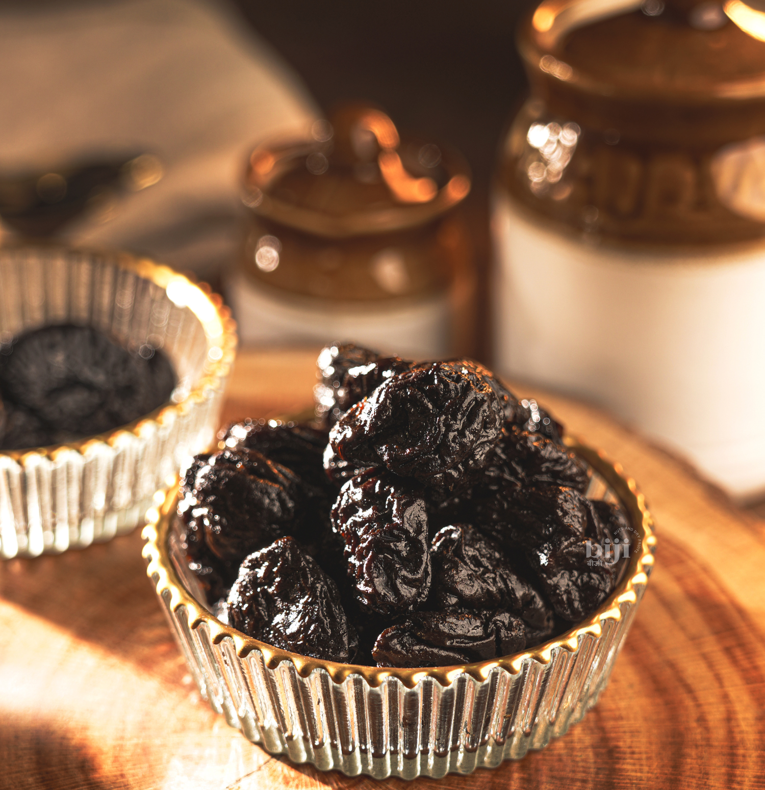 Dried Pitted Prunes in a glass bowl